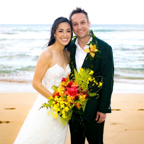 Doctor Heimerdinger with his wife on the beach both in wedding attire